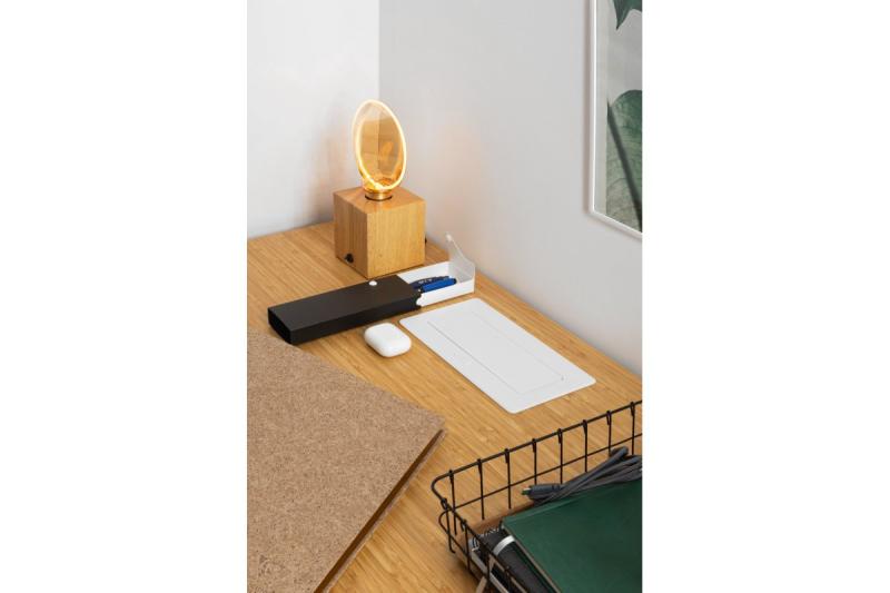 Pehmeä, ulosvedettävä pistorasiamoduuli.