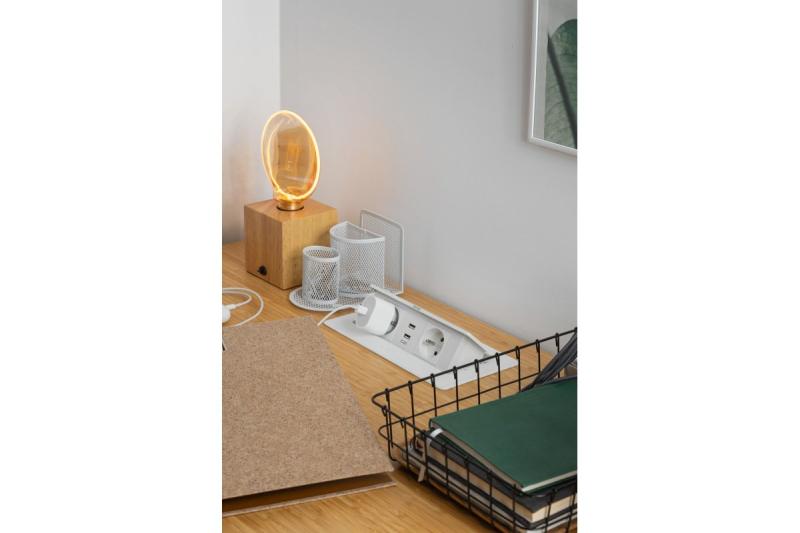 Pehmeä, ulosvedettävä pistorasiamoduuli.